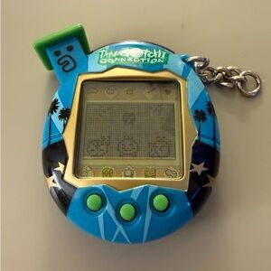 Tamagotchi Connection Handheld Console - Vibrant Blue and Green